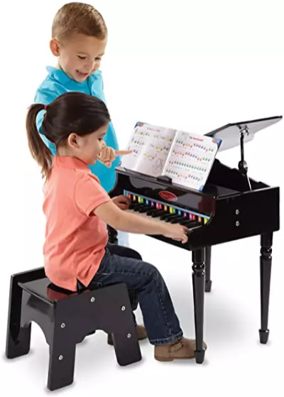 Toddlers Playing The Piano